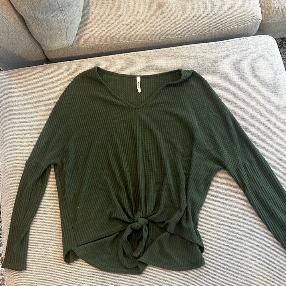 Long sleeve, tie front, waffle knit.